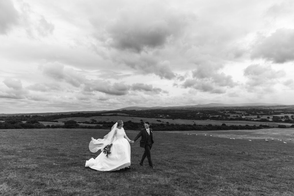Bride and groom couple shoot on Devon downs in black and white photo