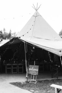 Rustic marquee wedding in Devon black and white photo
