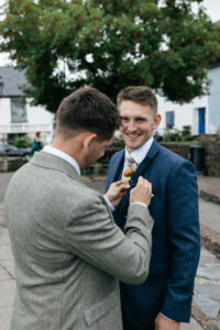 Video and photo of best man helps groom in Devon, UK Rustic farm family wedding in devon