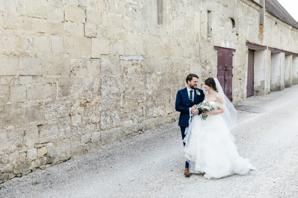 Bride and groom go to reception at French Chateau wedding photography and videography