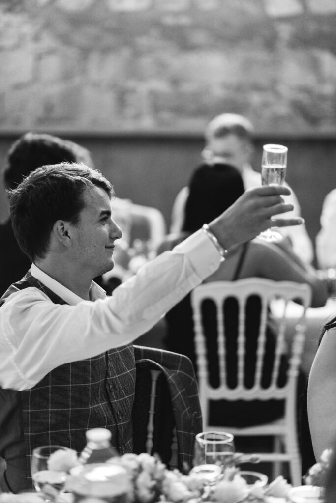 Raise a glass at French Chateau wedding photography and videography