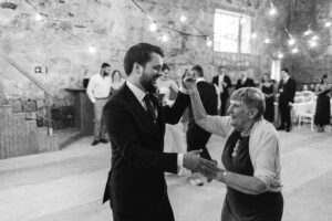 groom dancing with Grandma at wedding
