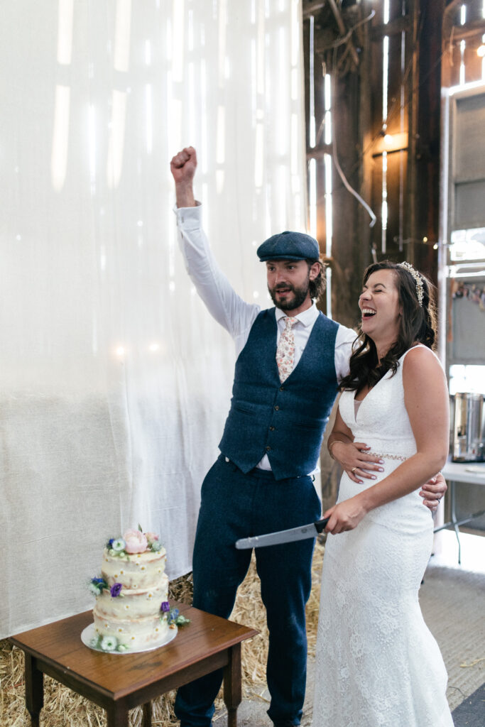 Couple cut their wedding cake 