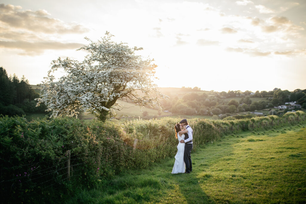 Couples photograph during sunset 