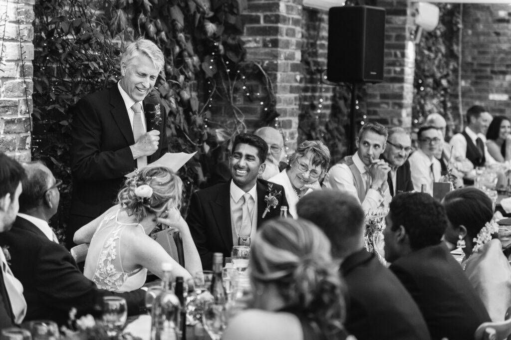 Groom laughs at father of the grooms wedding speech 