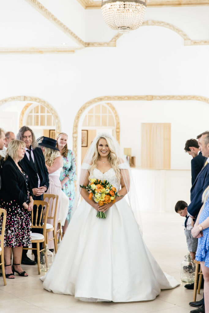 Bride walks herself down the isle during her wedding day 