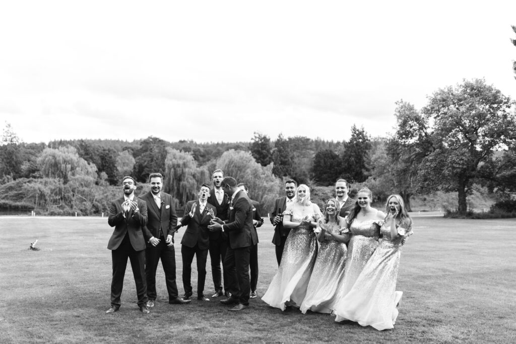 Bridal parties reaction to bride walking out in her new dress on thr wedding day 