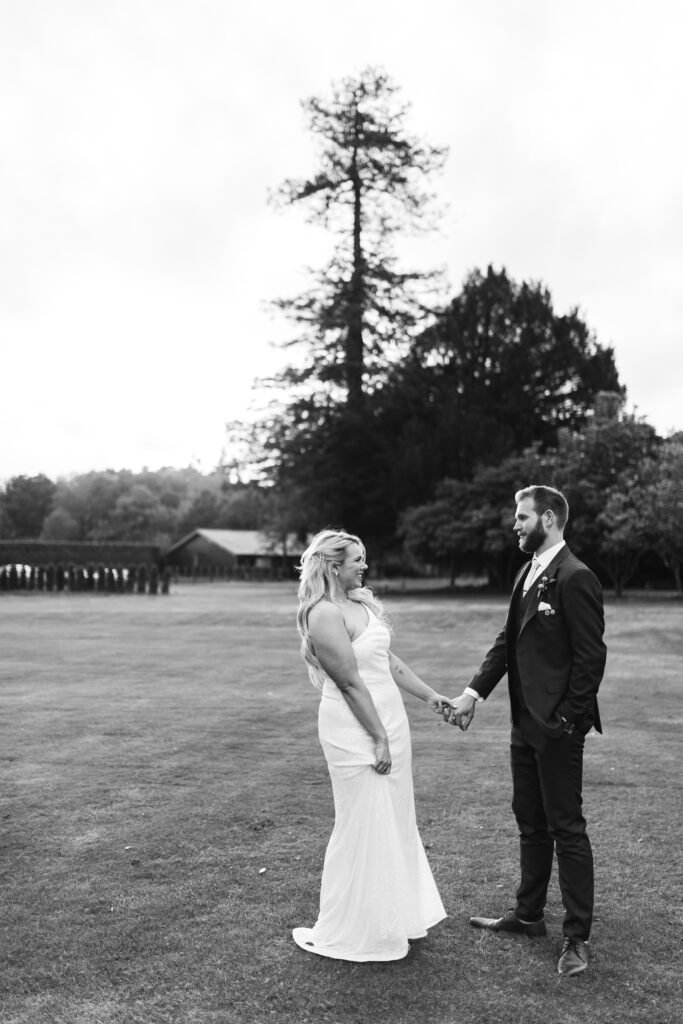 Couple pose for photograph during wedding photographs 