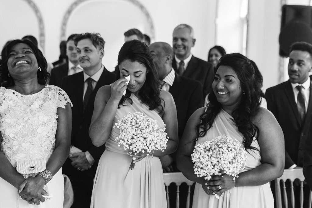 Bridemaid cries during wedding ceremony 