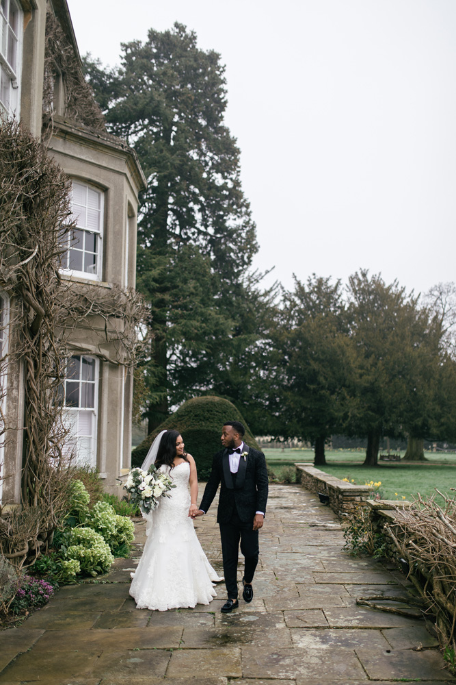 Couple take a walk during wedding reception